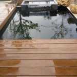 งานบ่อน้ำพุ ม่านน้ำดีไซน์ ระแนงพื้นไม้เทียม บ่อปลาคาร์ฟพร้อมระบบกรองบ่อปลา By Baansuannam Design & Construction